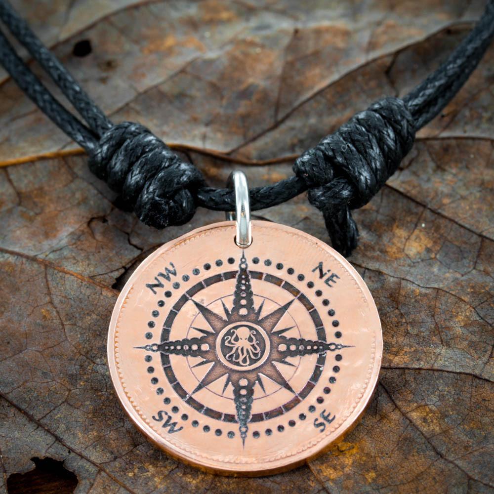 Copper coin Compass necklace with a Kraken Engraved by NameCoins